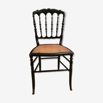 Cane chair in turned and blackened wood