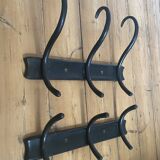 Old black curved wooden coat rack