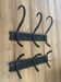 Old black curved wooden coat rack