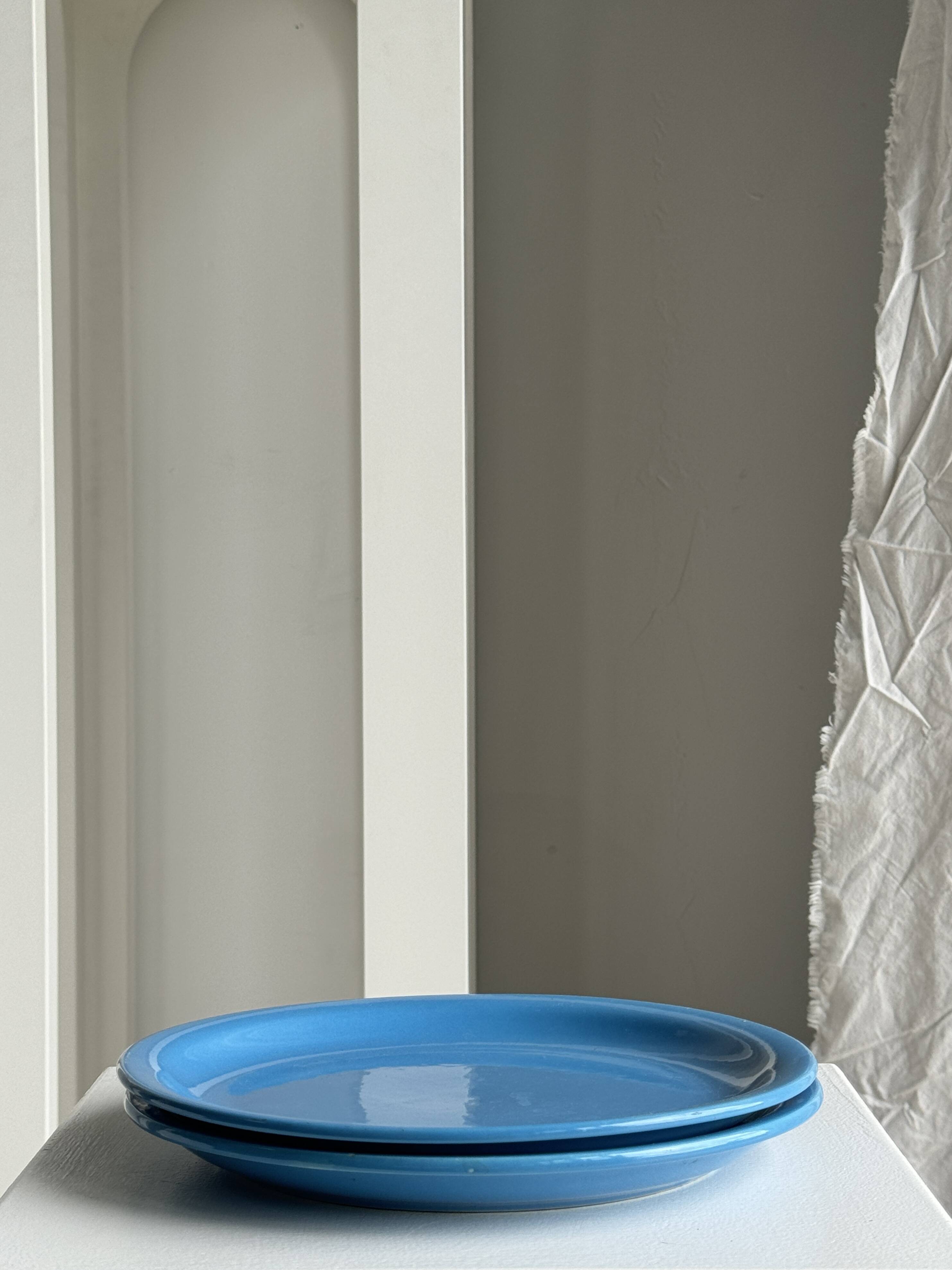 Set of 2 sky blue plates, one slotted