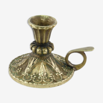 Golden bronze hand-held candlestick