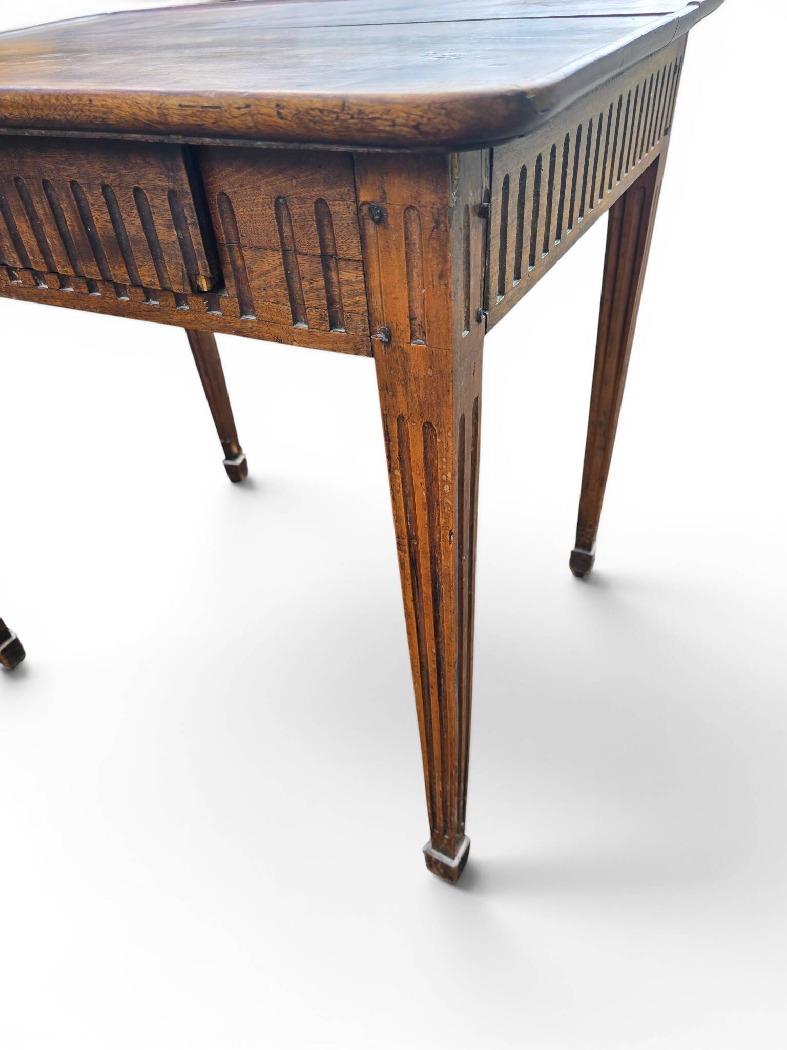 Antique game table in patinated wood in the Louis XVI style.