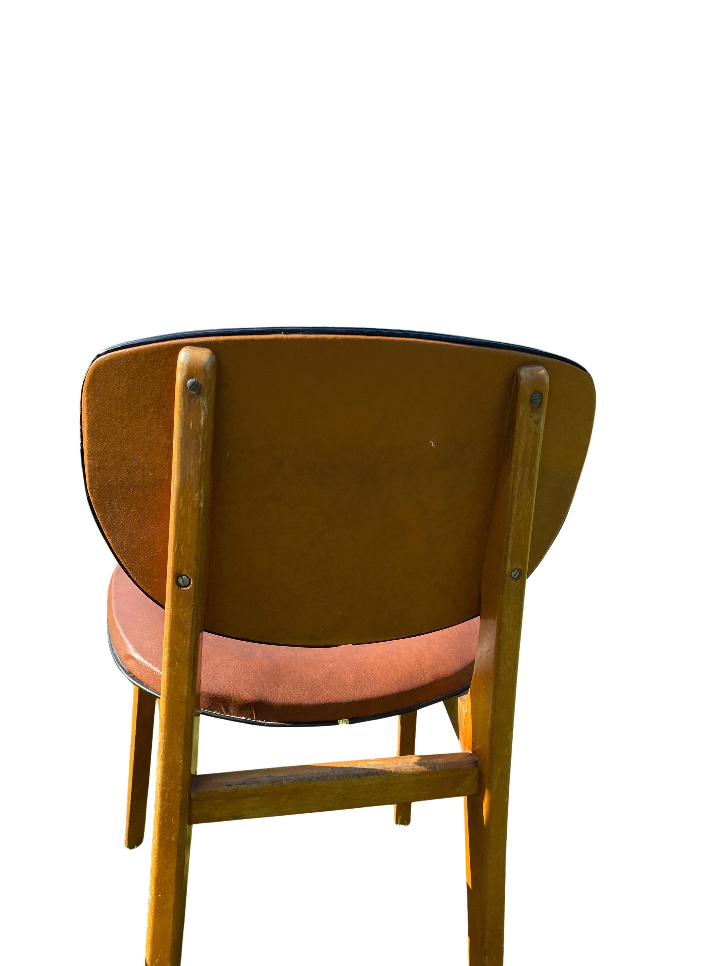 Pair of Scandinavian wood and leather chairs, Circa 1960