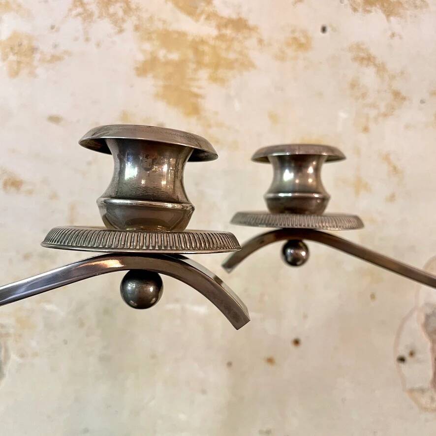 Pair of silver-plated metal art deco candlesticks