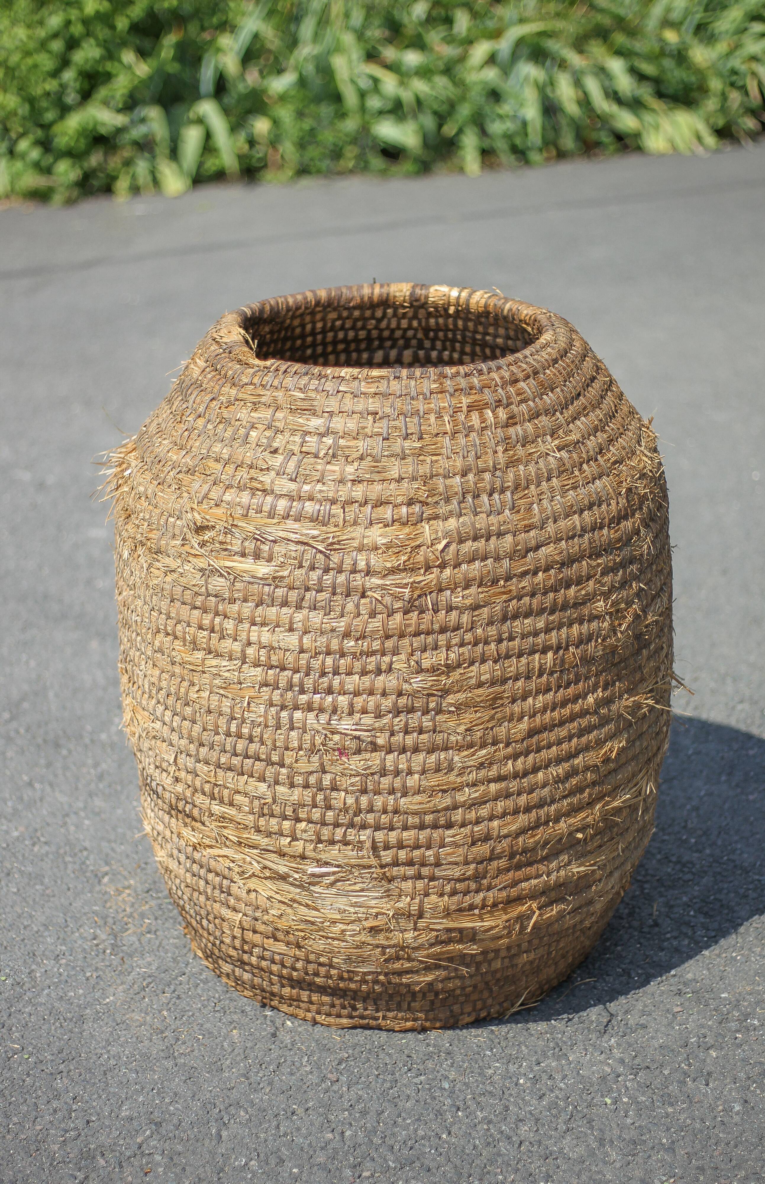 Very large old basket, burgundy straw and bramble, woven basket