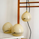 Yellow opaline hand lamp