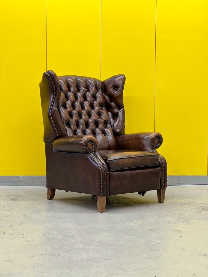 Brown vintage handmade chesterfield recliner armchair