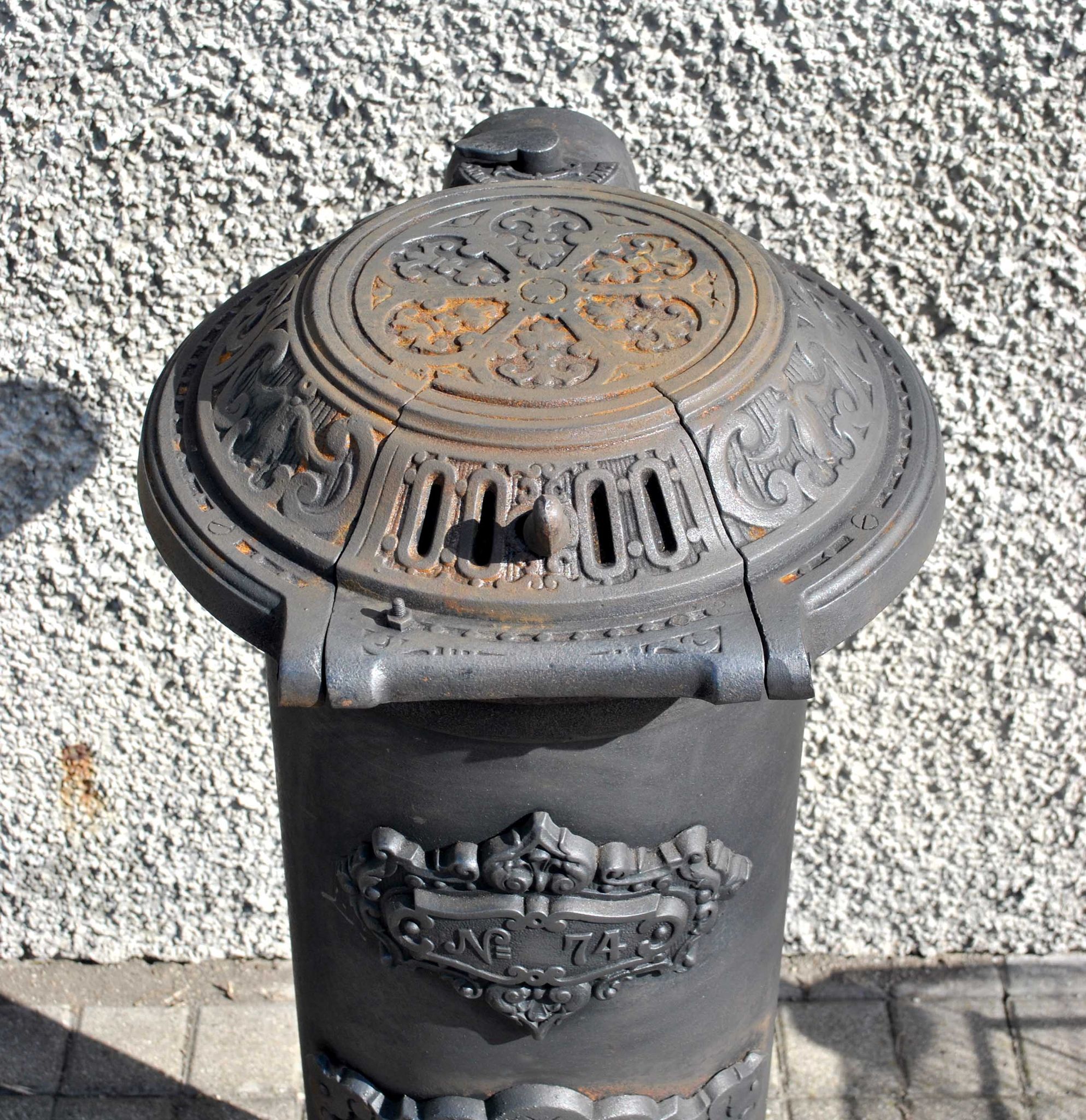 Antique decorative stove in black cast iron Germare charcoal