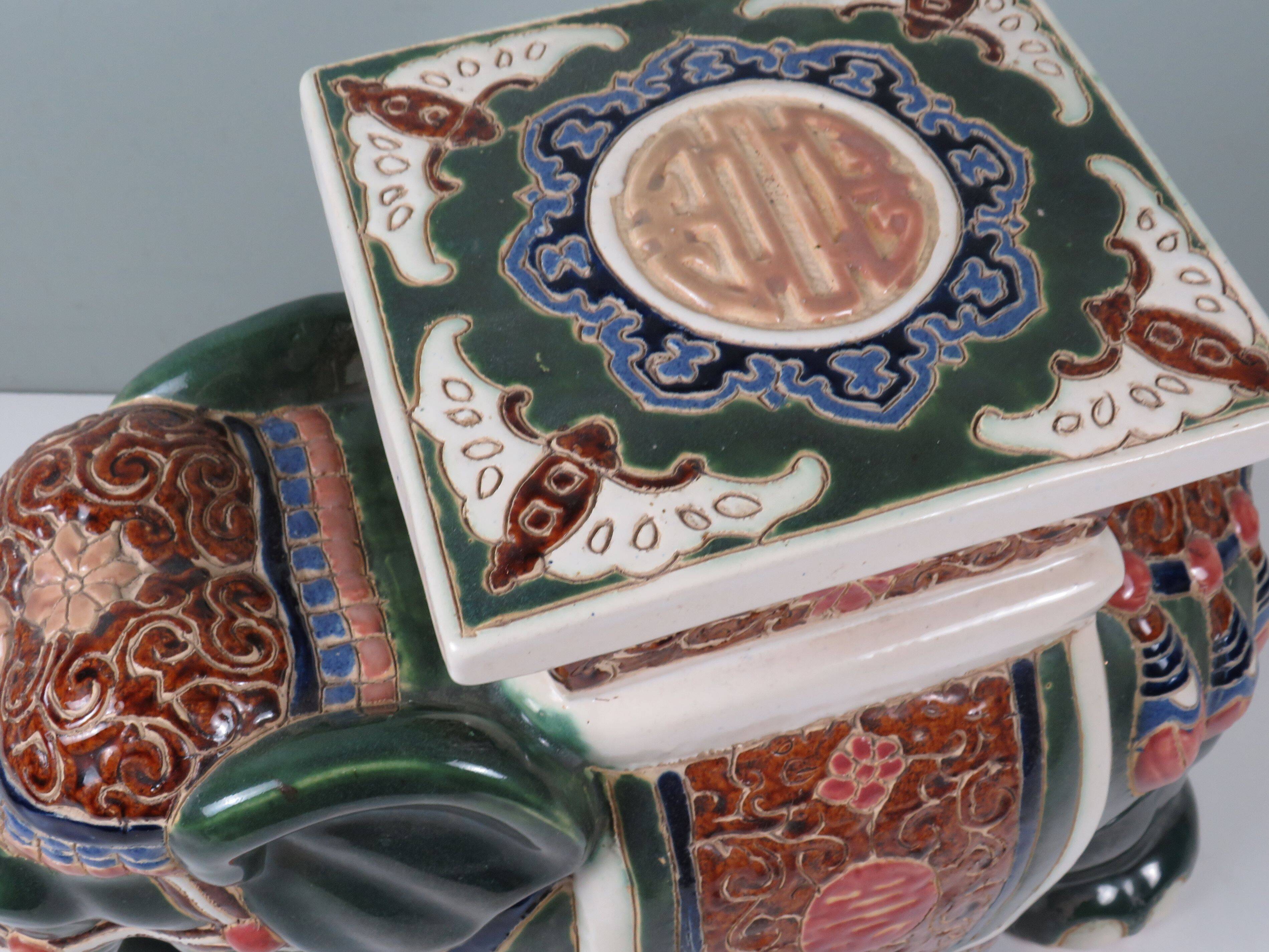 Large vintage ceramic elephant in glazed finish, stool or side table.