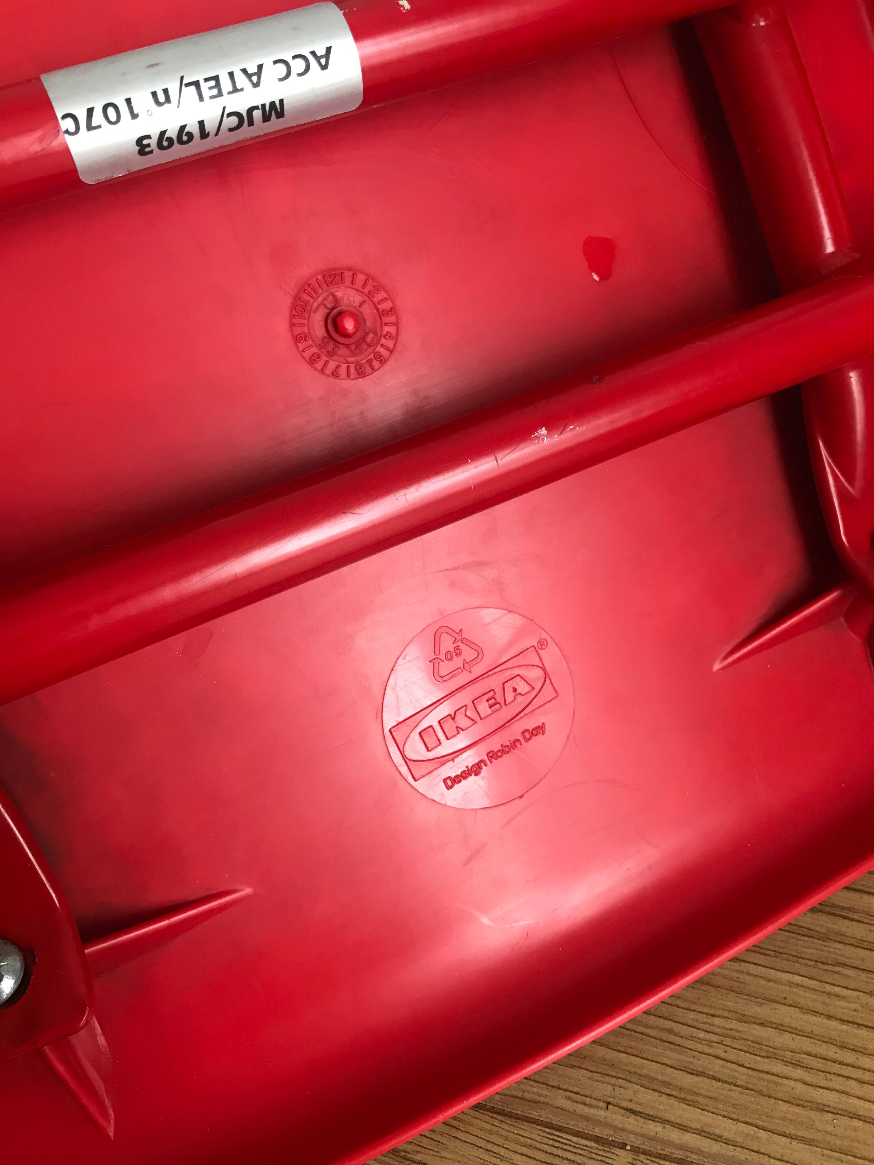 Red child chair by robin day for ikea