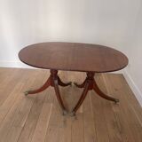 Antique table with wrought iron leg