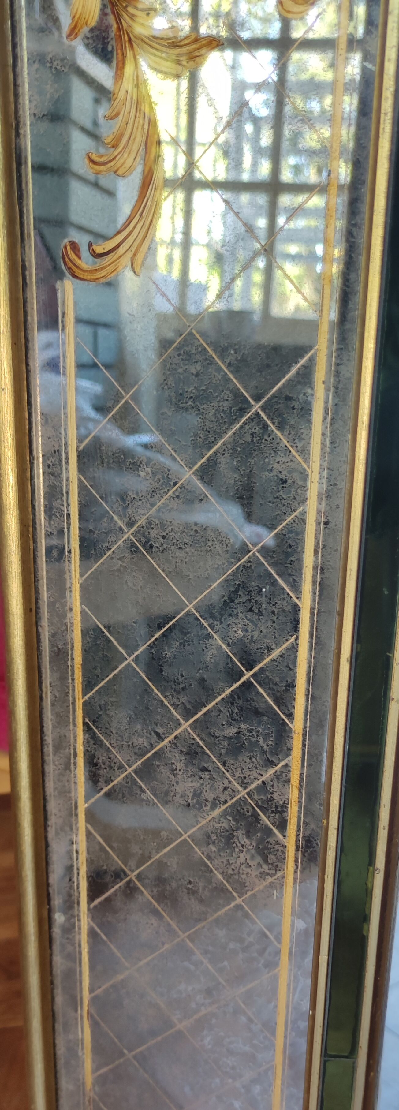 Old parecloses mirror, engraved decoration