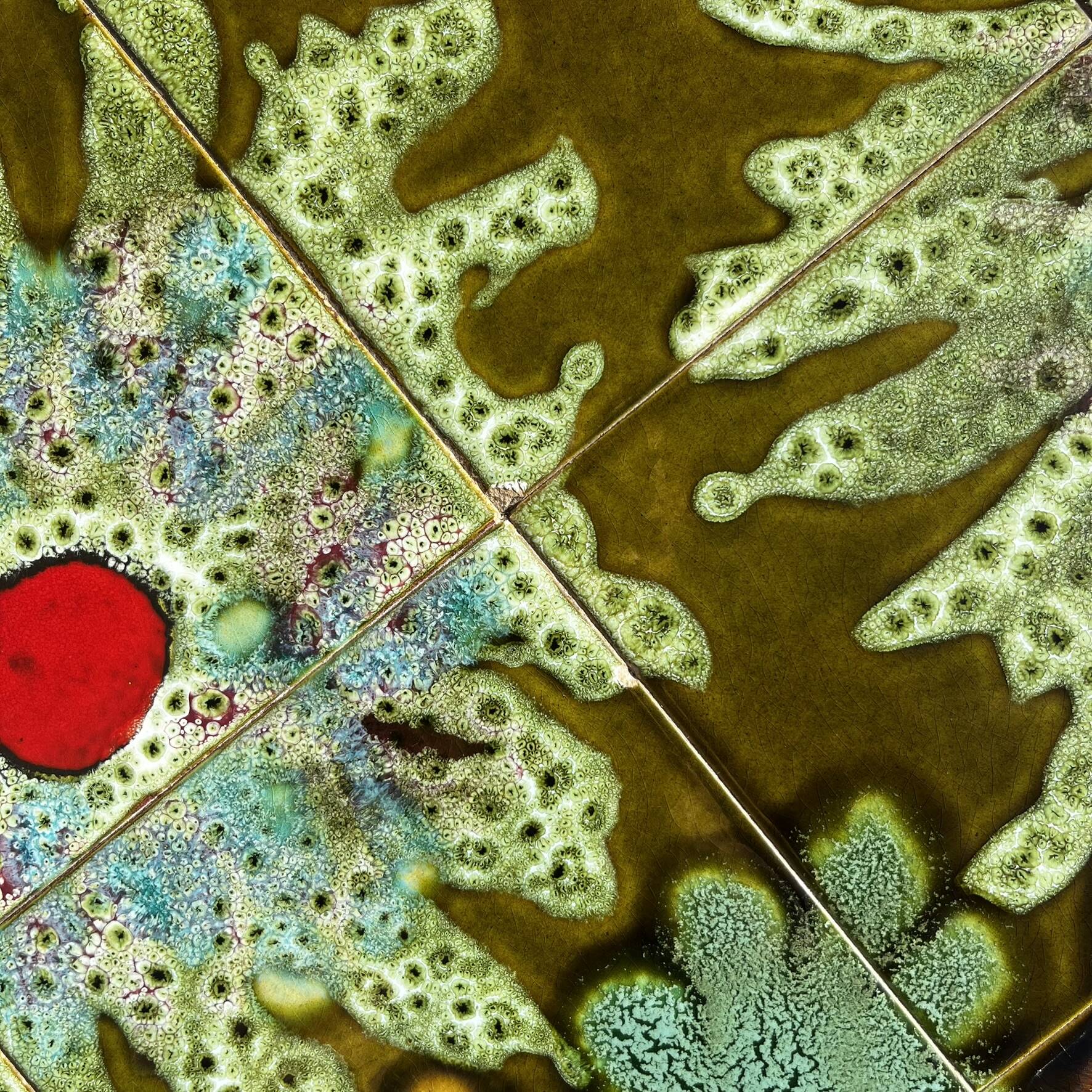 Vintage ceramic coffee table, floral patterns and chrome base.