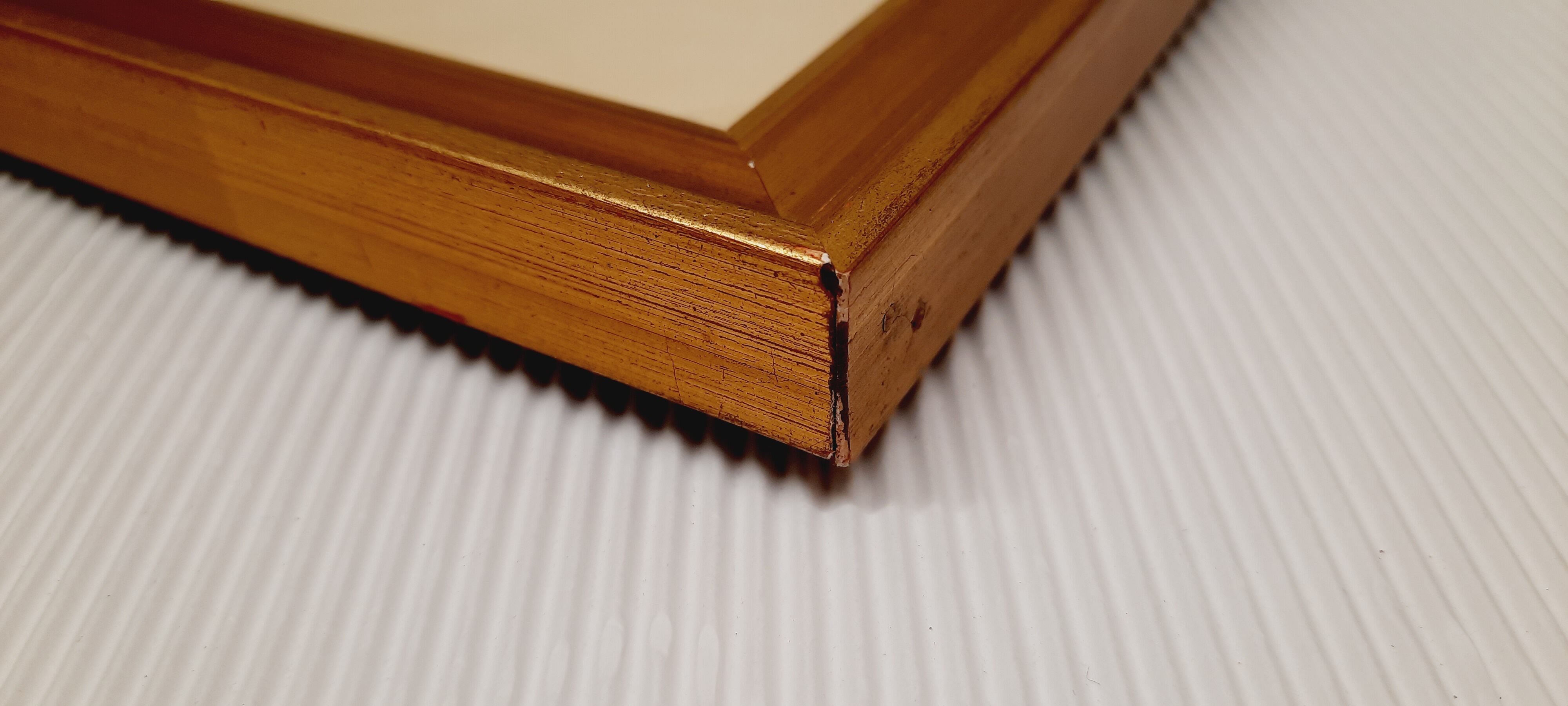 Gilded wood frame