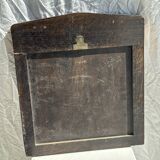 Small antique English rectangular mirror with pediment and oak frame