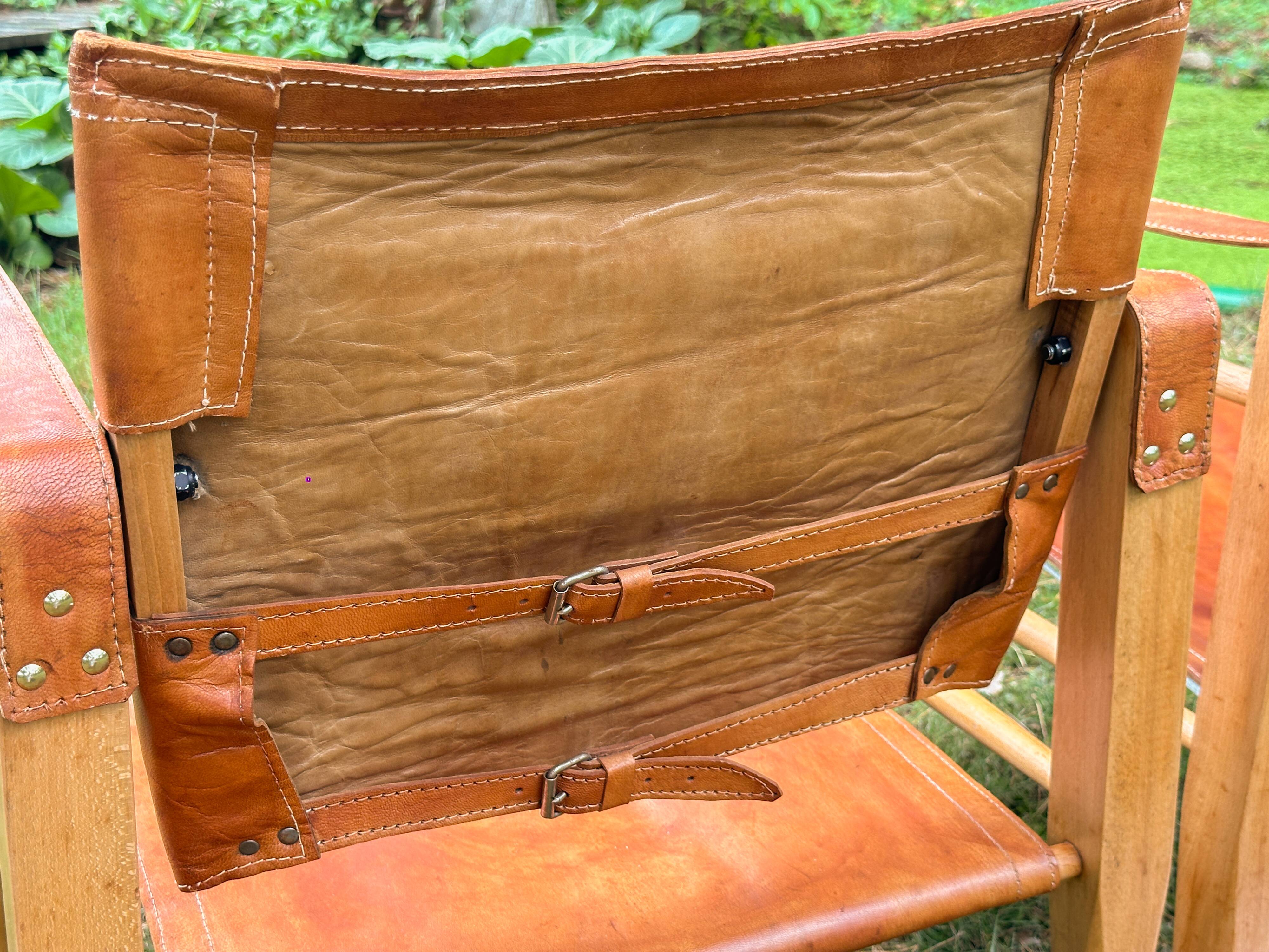 A pair of Danish beechwood and leather Safari armchairs - 1960