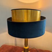 Brass lamp with asymmetrical velvet shade