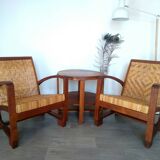 Pair of Art Deco woven rattan armchairs and table