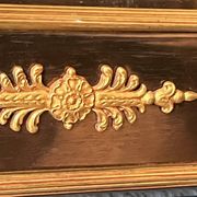 Empire-style fireplace decoration.