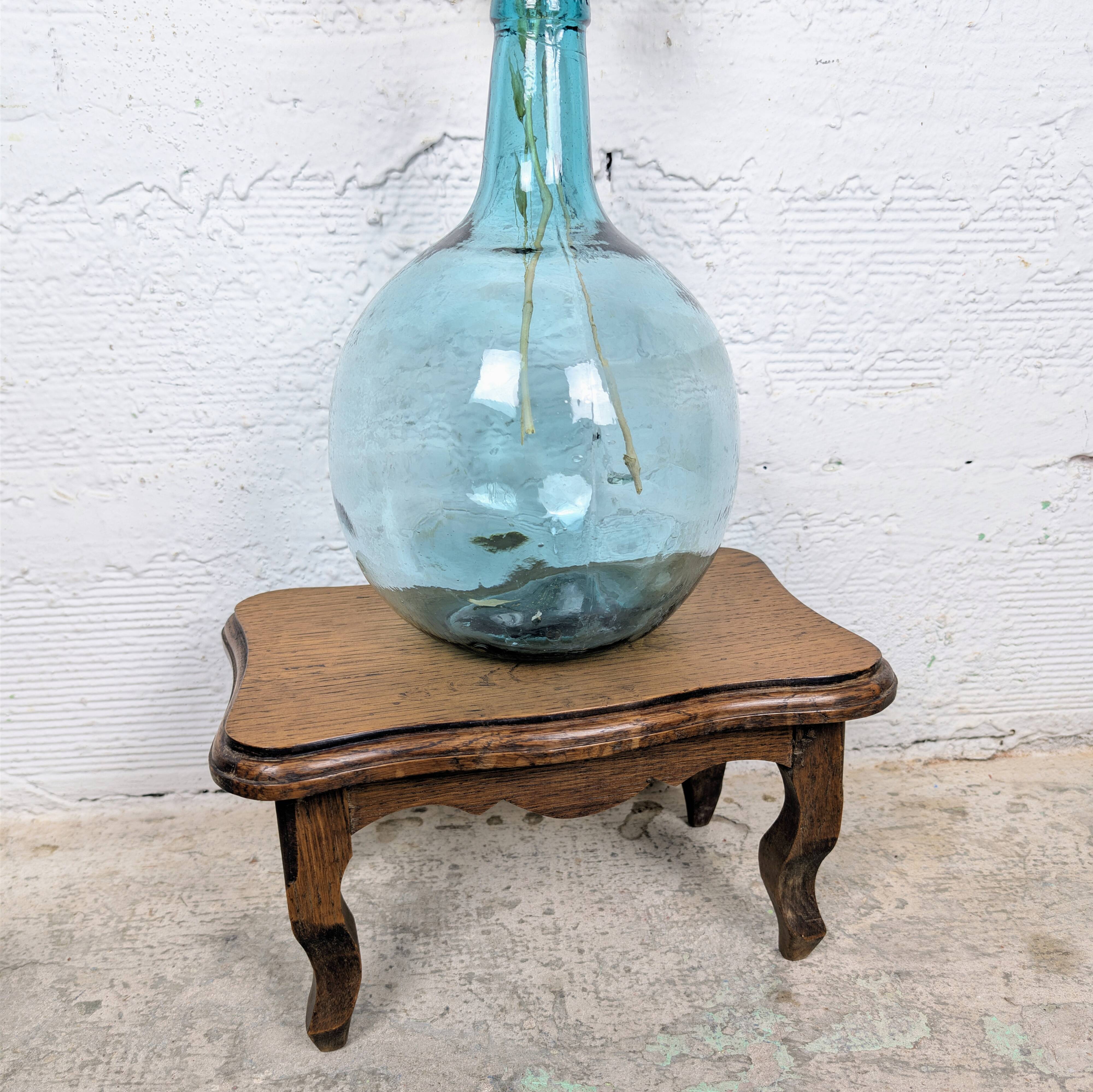 Antique footstool with rustic charm