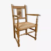 Fauteuil néo basque en bois clair et assise cannée