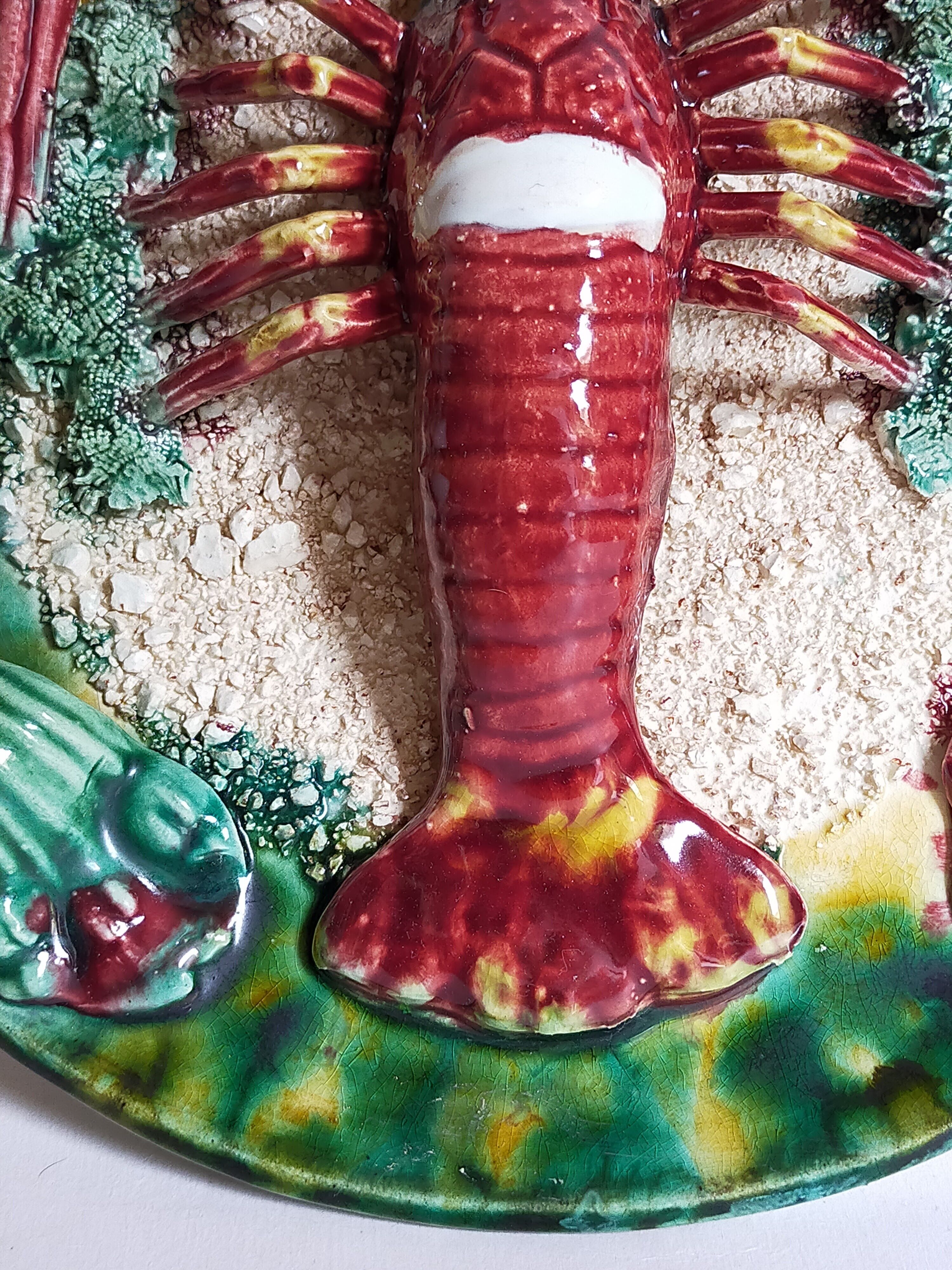 Plate in old barbotine with lobster