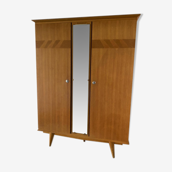 Scandinavian-style wooden cabinet with mirror