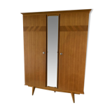 Scandinavian-style wooden cabinet with mirror