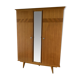 Scandinavian-style wooden cabinet with mirror