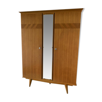 Scandinavian-style wooden cabinet with mirror