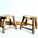 Pair of wood and straw fireplace stools, 1950s