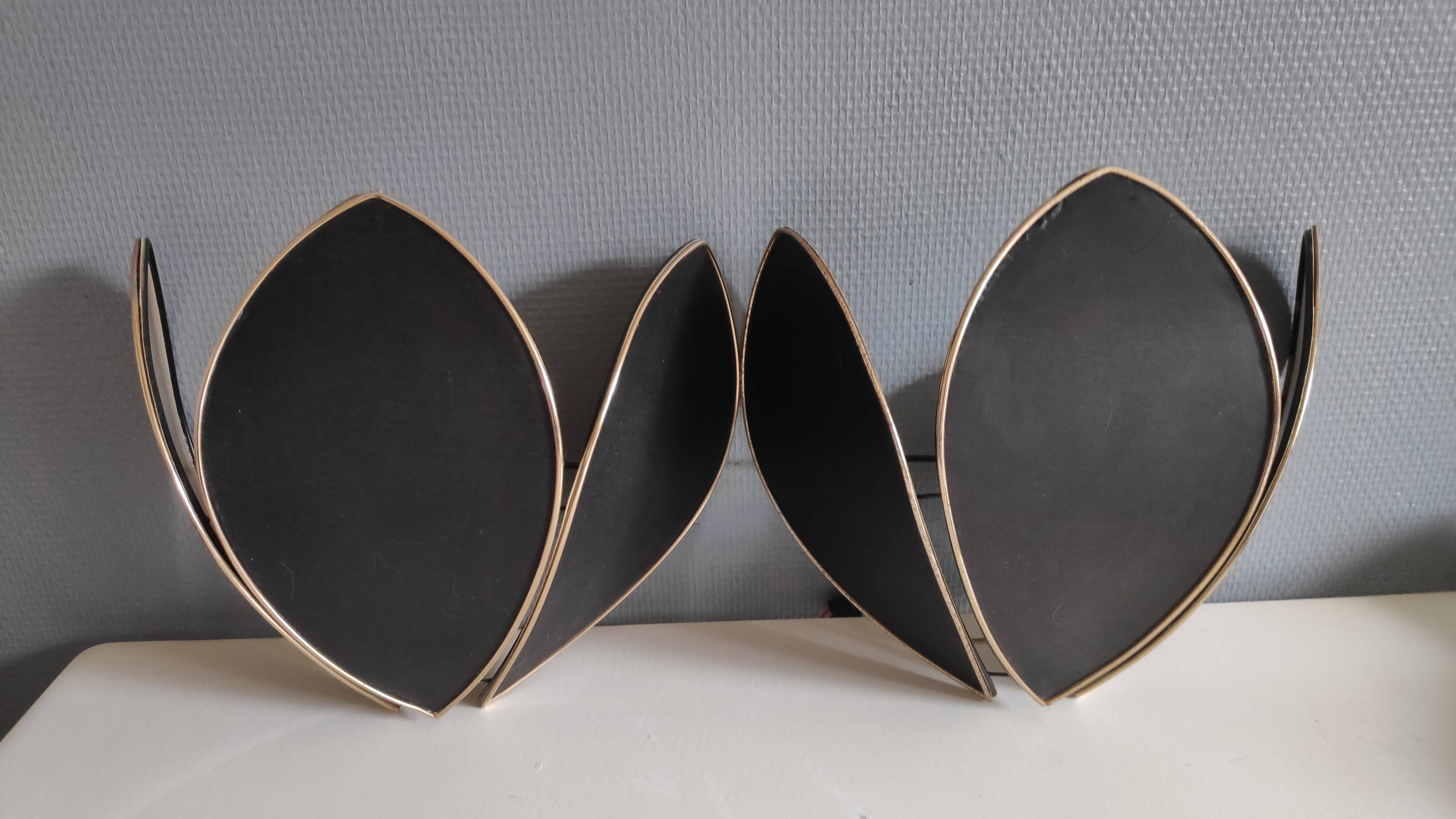 Black and gold wall lamps