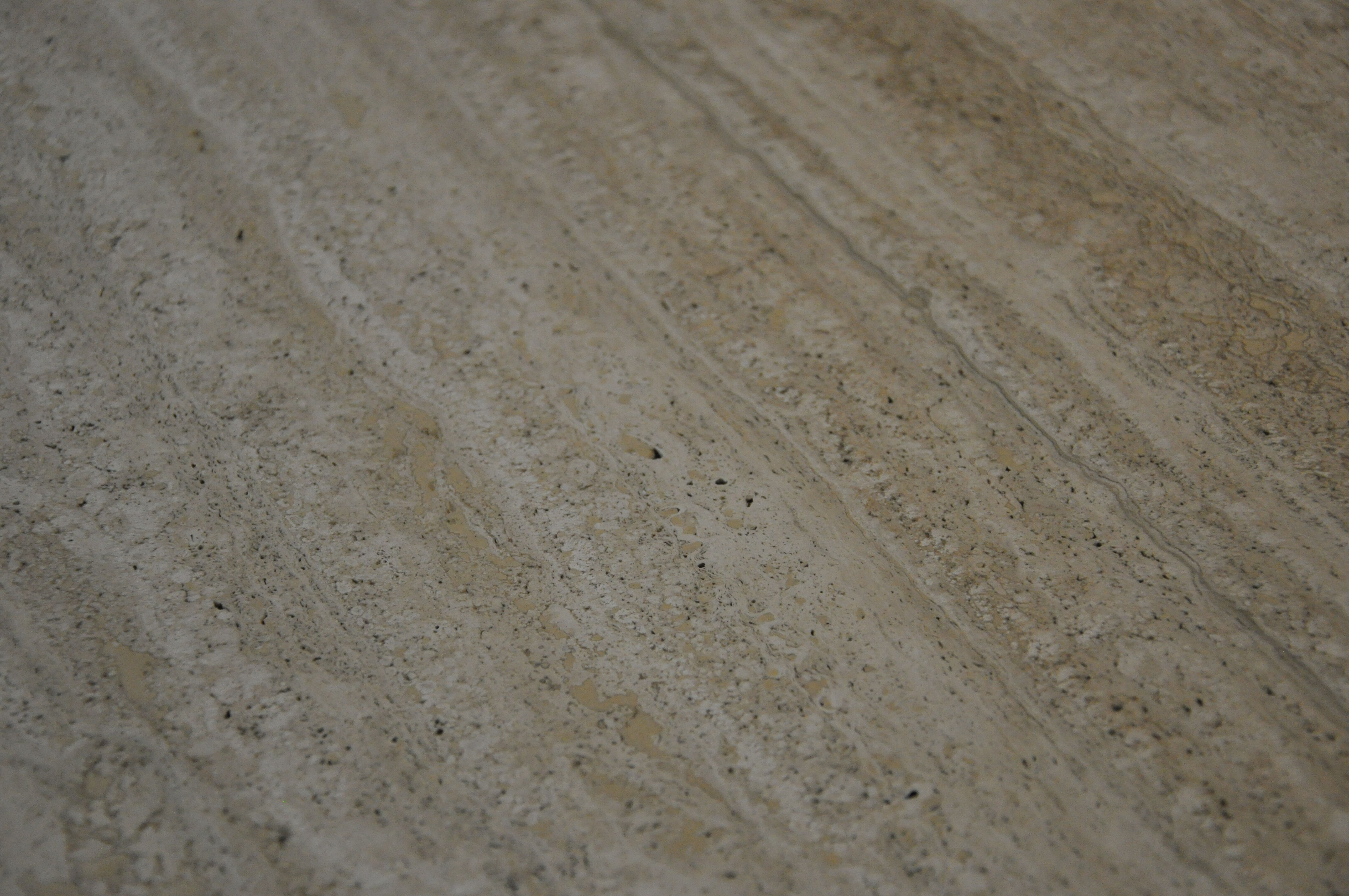 Round travertine table