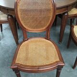 Table and six chairs in the Louis XVI style mahogany