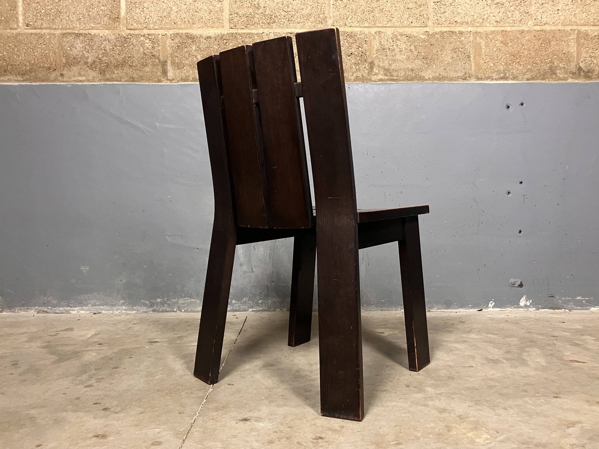 Brutalist and modernist dining chairs from the 1970s in architectural brown wood.