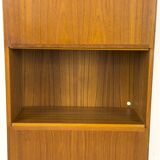 Narrow teak bookcase with two doors by Omann Jun, 1970s