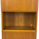 Narrow teak bookcase with two doors by Omann Jun, 1970s