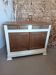 Antique wooden buffet with linen
