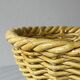 Yellow ceramic basket with wicker effect