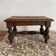 Low stool in carved wood