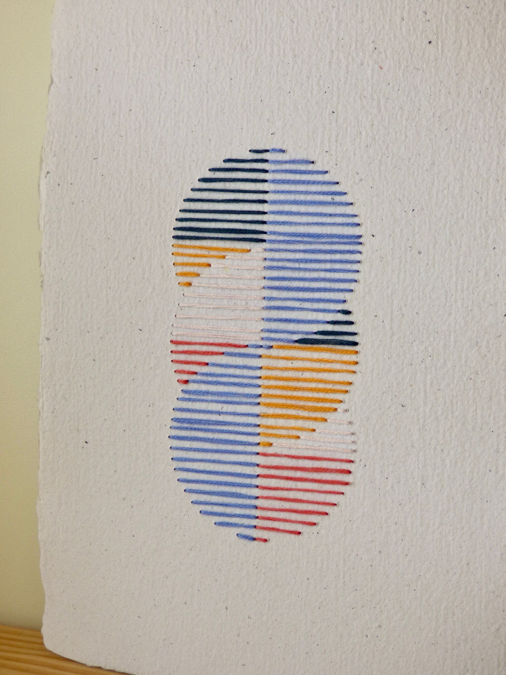 Embroidery on rag paper