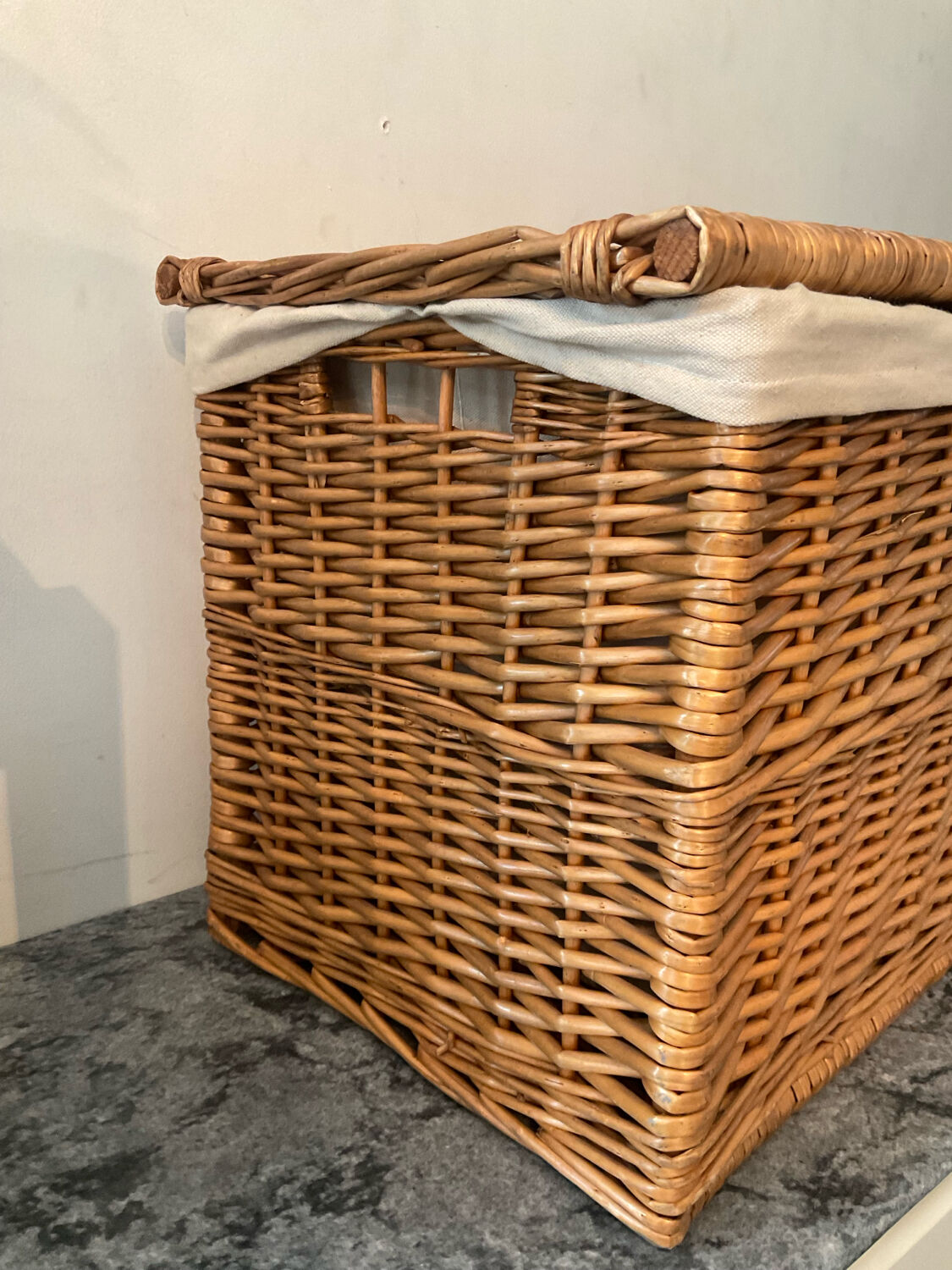 Woven wicker vintage suitcase
