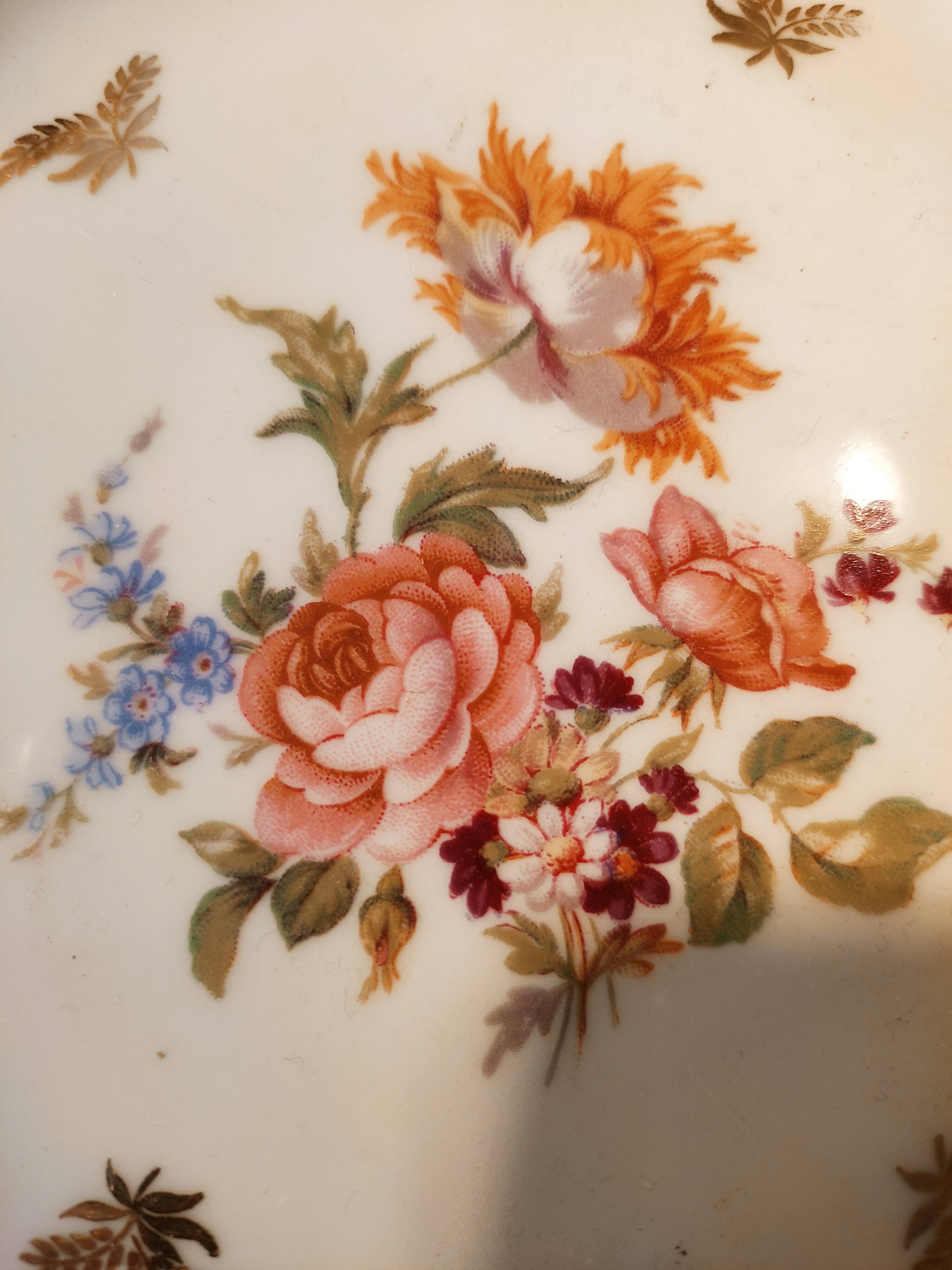 6 mismatched dessert plates decorated with roses