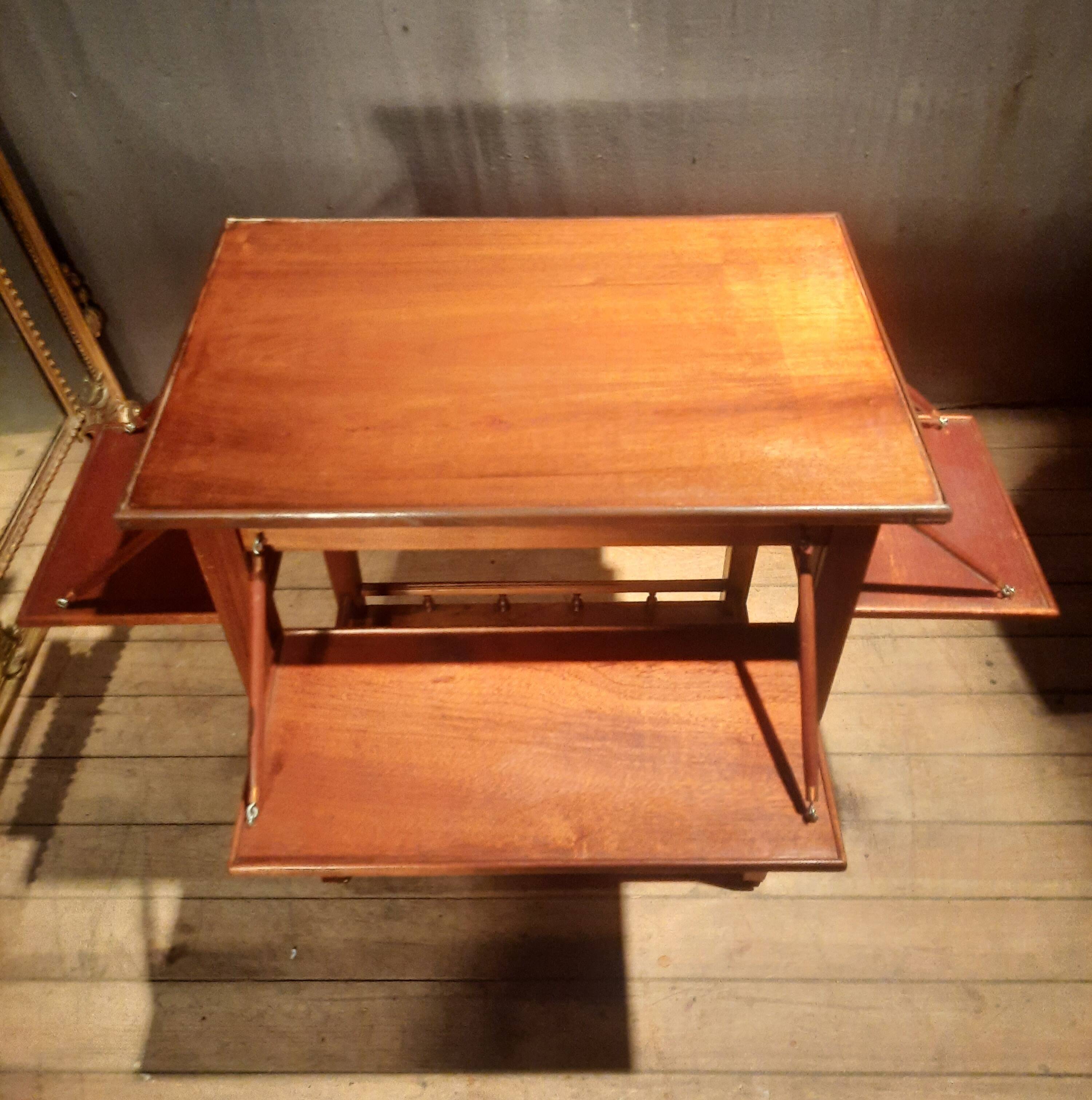 Sideboard with four drop-leaves