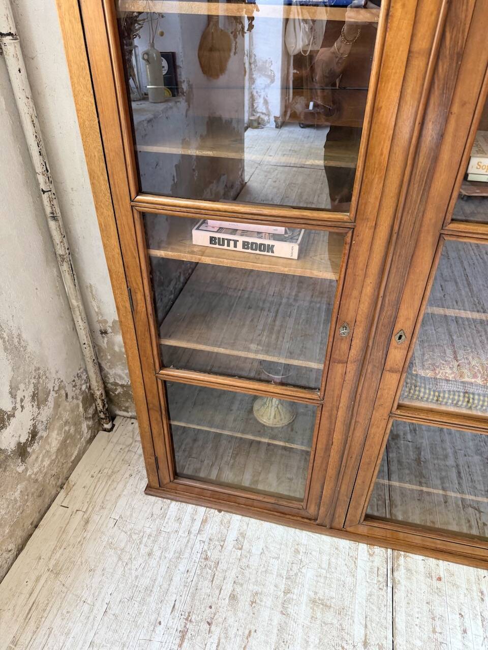 Glass-fronted walnut library 1900