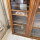Glass-fronted walnut library 1900