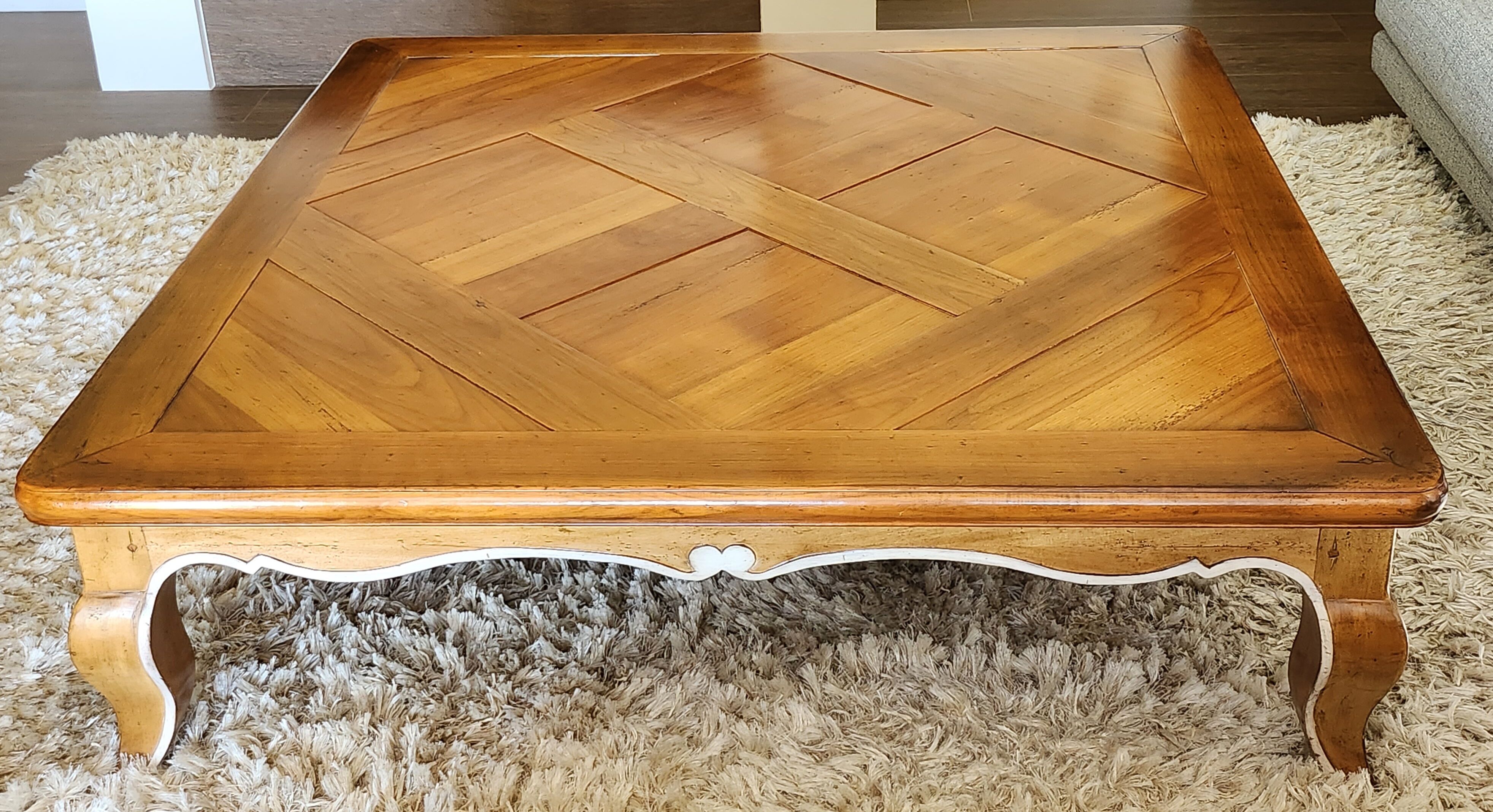 Square coffee table in cherry Roche Bobois