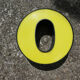 Yellow and black industrial sign "O" letter