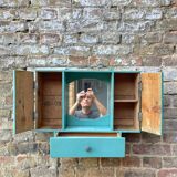 Old wall-mounted bathroom cabinet