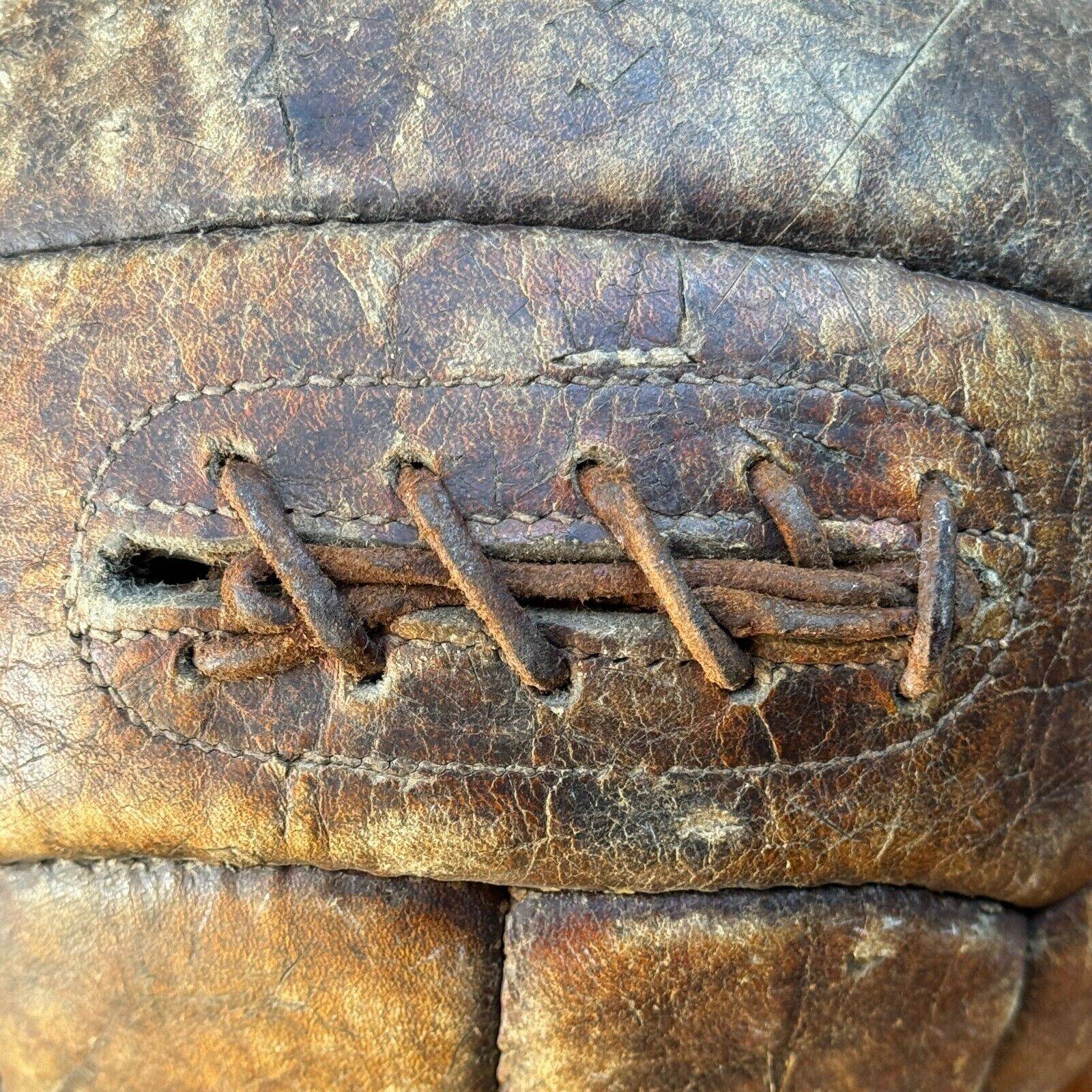 Mid-20th century leather soccer ball with visible stitching and beautiful patina